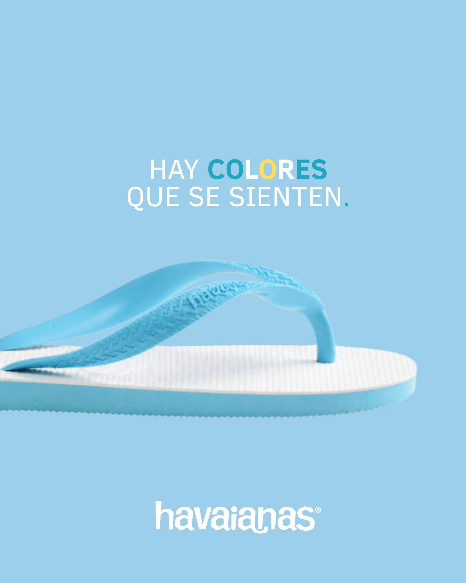 Pieza de campaña sobre fondo celeste: una ojota y el titular «Hay colores que se sienten»